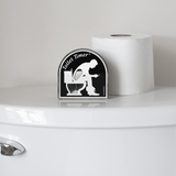 toilet timer in bathroom with toilet paper